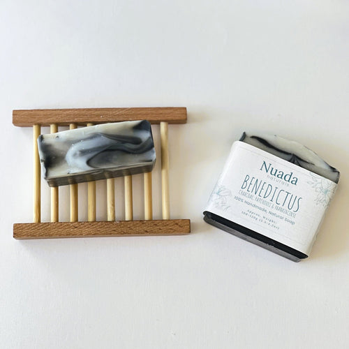 Nuada Naturals Benedictus charcoal, patchouli, and frankincense soap with branded label