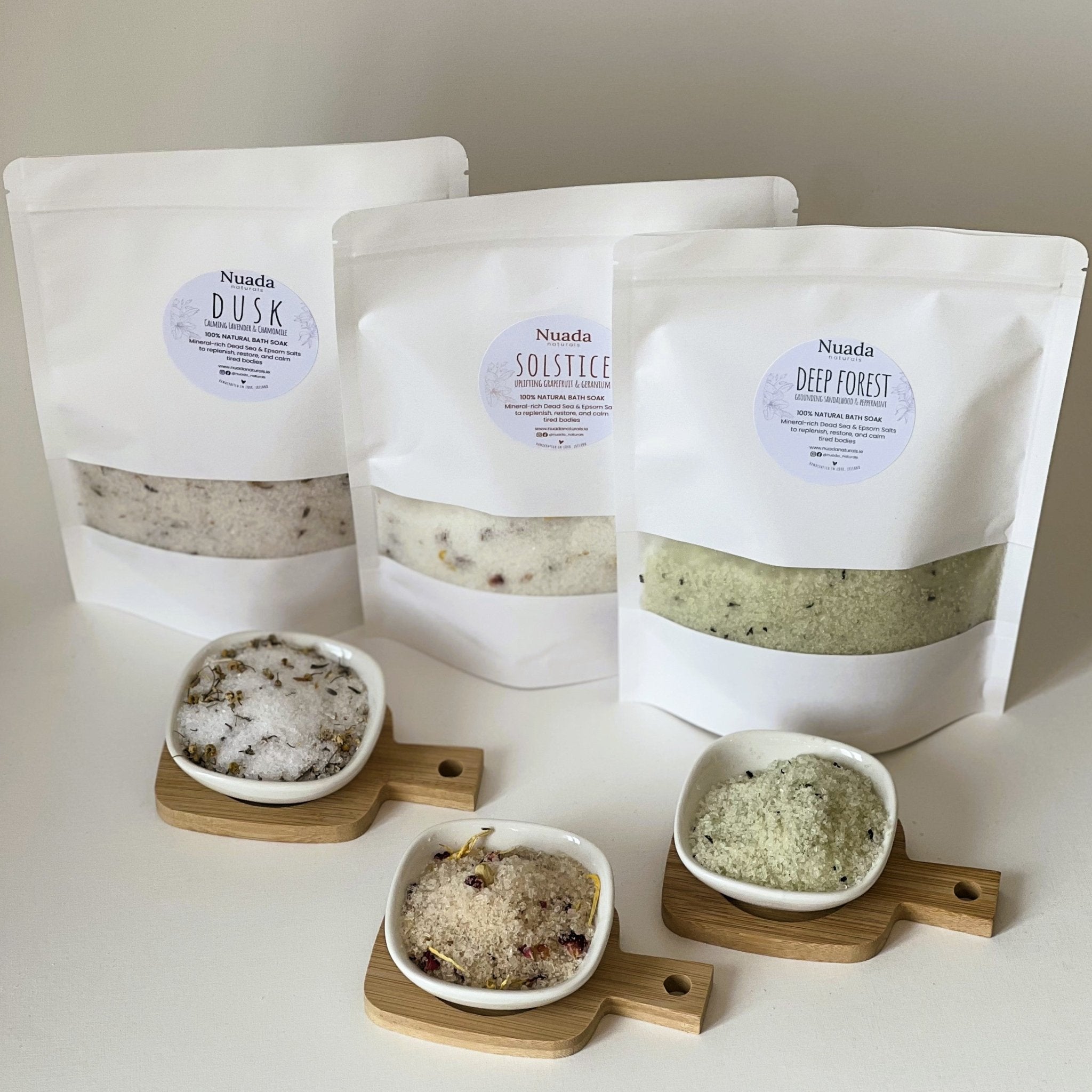 Nuada Naturals Dusk, Solstice, and Deep Forest bath soak pouches and salt dishes