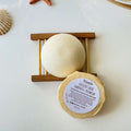 Nuada Naturals Golden Shore grapefruit and yellow clay sea salt soap with round label