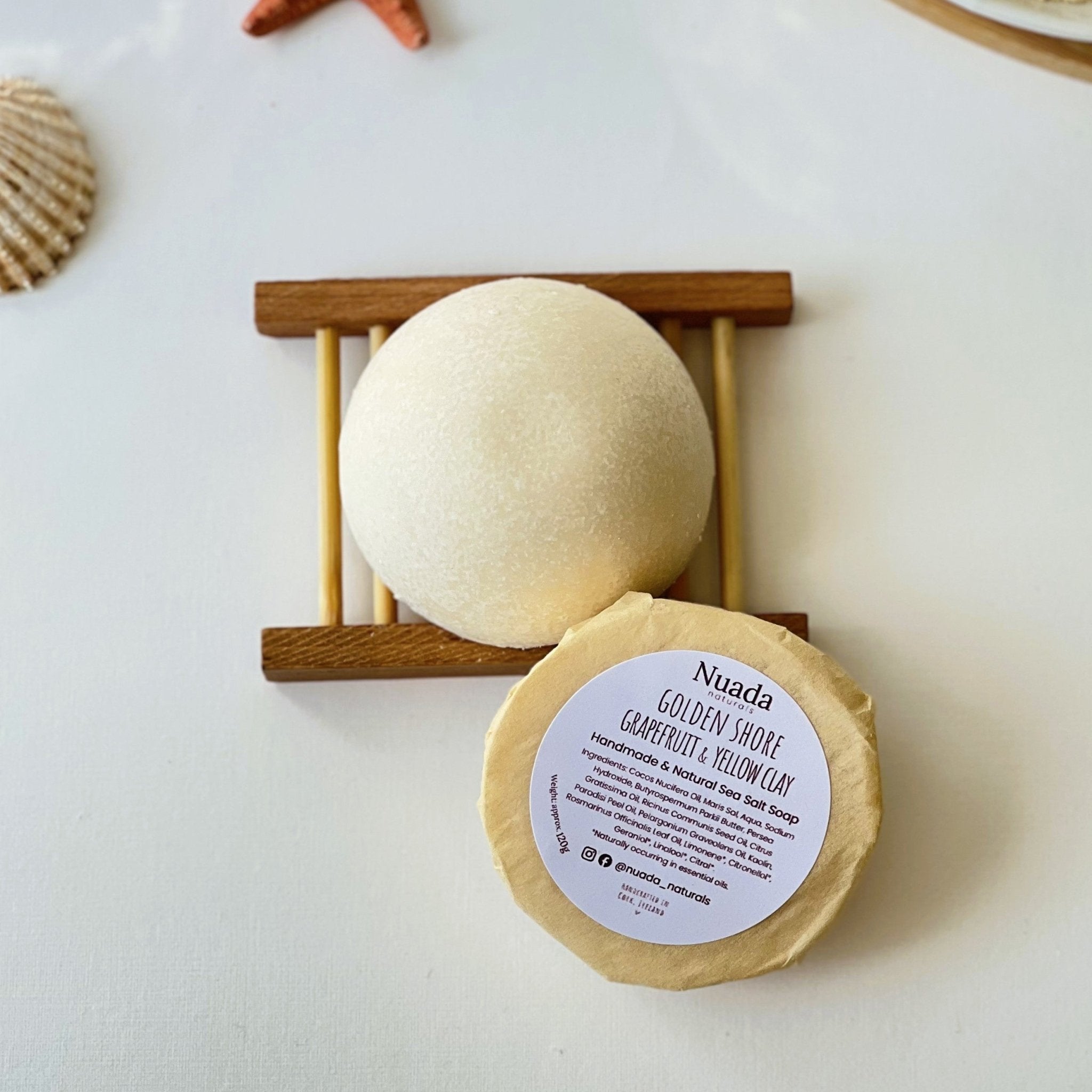 Nuada Naturals Golden Shore grapefruit and yellow clay sea salt soap with round label