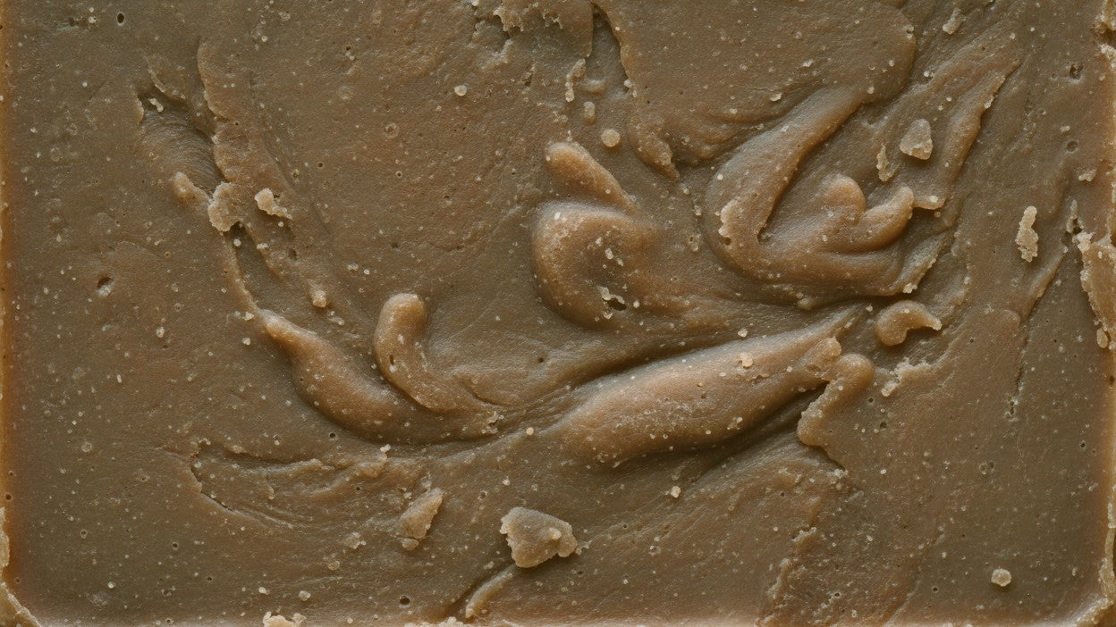 Close-up of a brown soap surface with abstract patterns