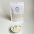 Nuada Naturals Milk and Oats skin-soothing bath boost pouch with oat powder dish