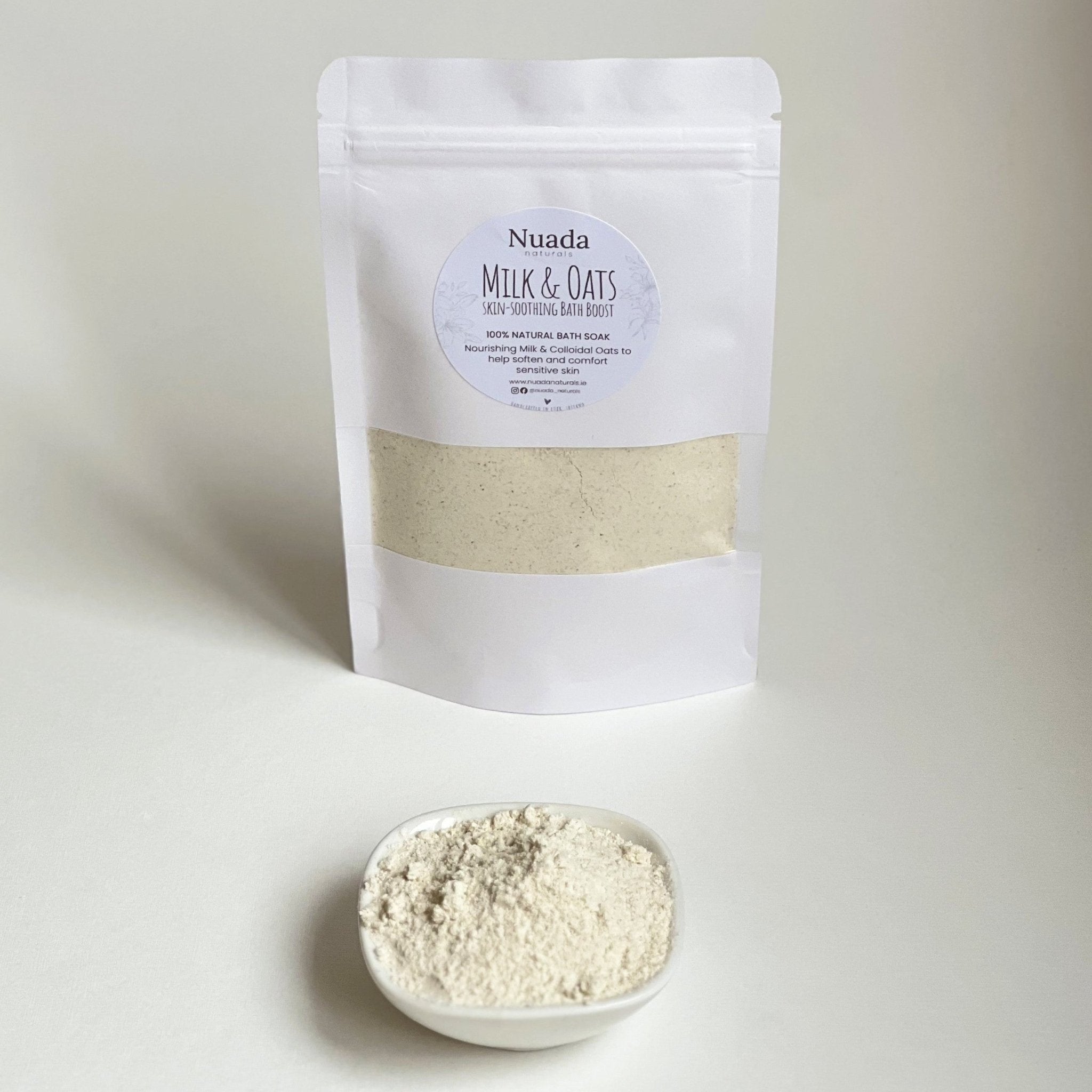 Nuada Naturals Milk and Oats skin-soothing bath boost pouch with oat powder dish