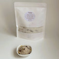 Nuada Naturals Solstice bath soak pouch with small ceramic dish of bath salts